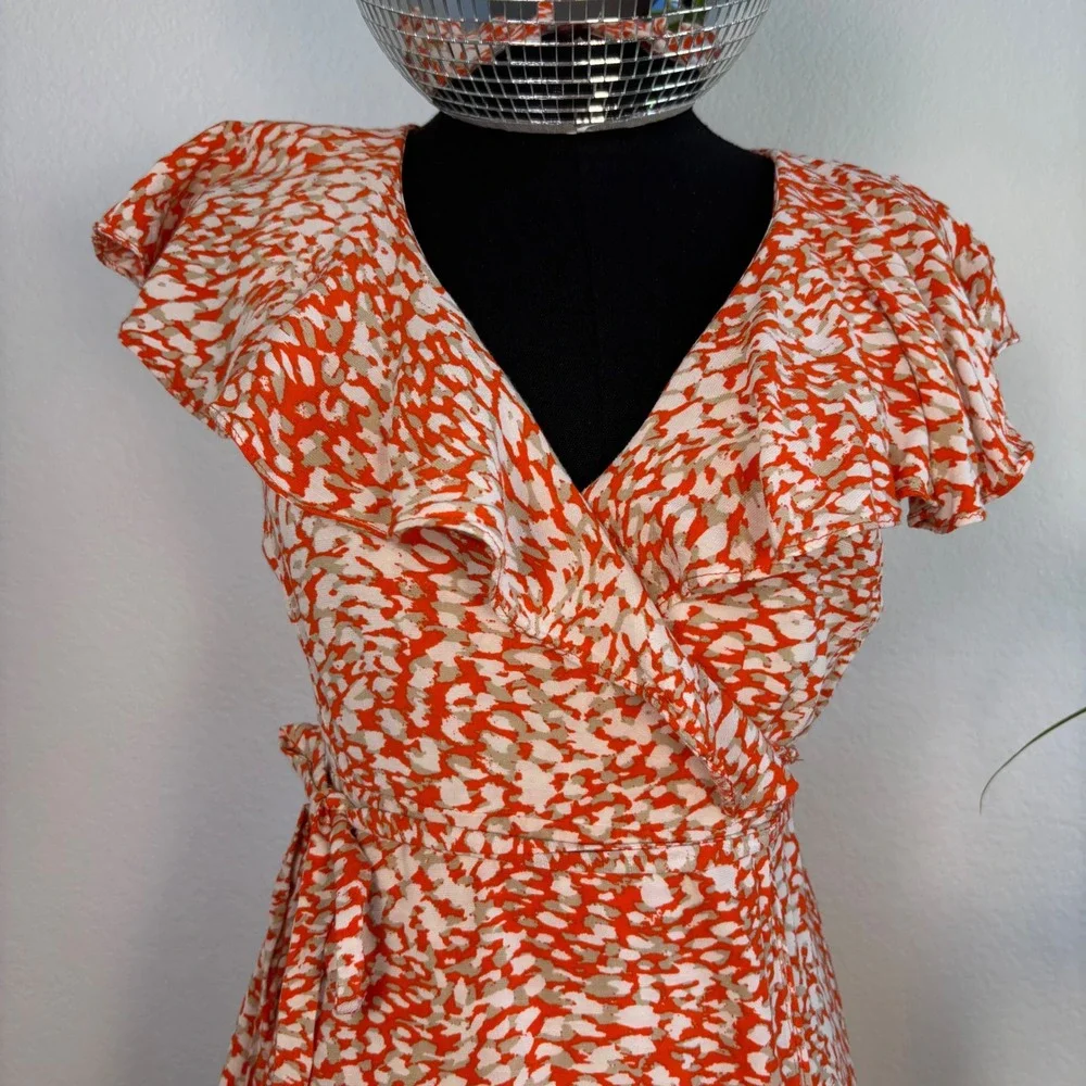 Free People French Quarter mini wrap dress, Small Orange White Animal Print boho